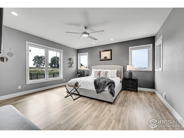 a bathroom with a sink toilet and a mirror