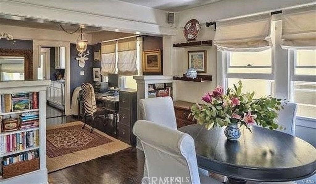 2411 3rd Street, Unit K Santa Monica, CA 90405 - Photo 5 of 18 a view of a dining room with furniture and a potted plant
