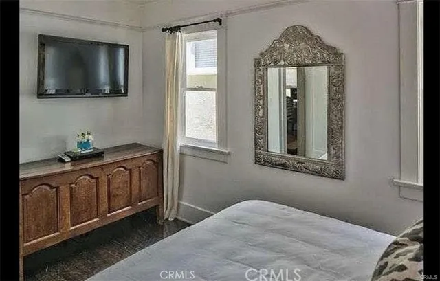a kitchen with a sink cabinets and a window