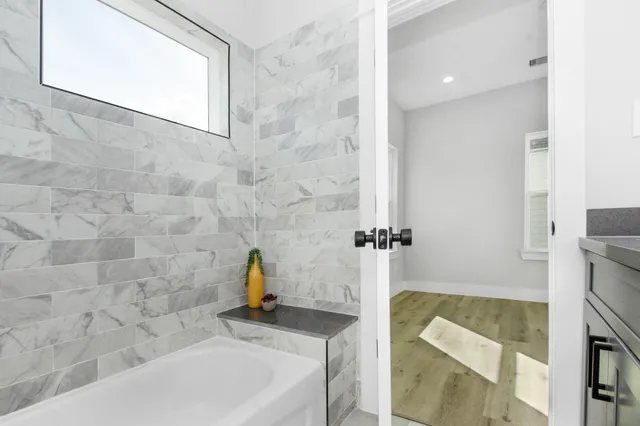 a bathroom with a sink and a bathtub