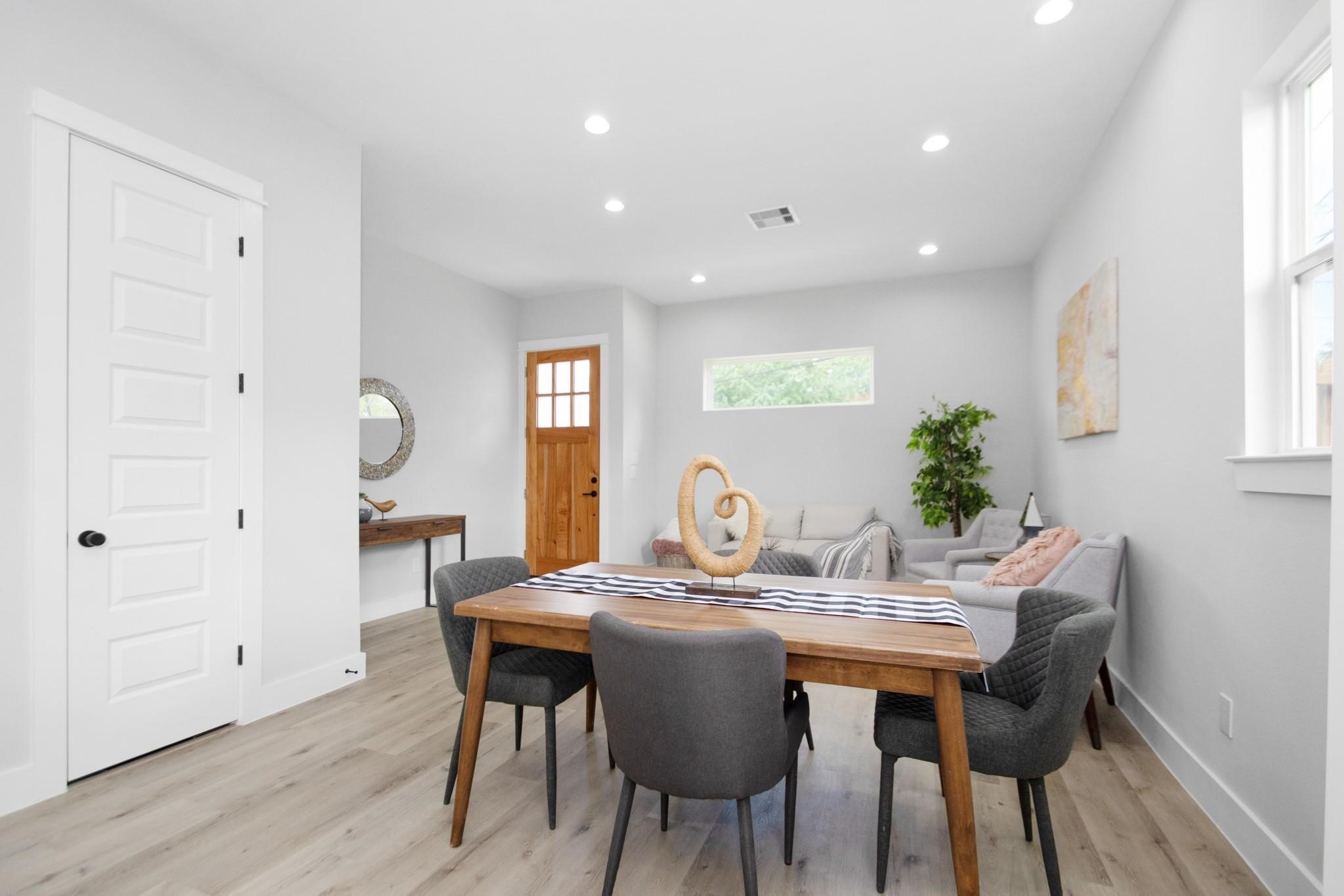 2105 Sam Wilson Street, Unit A Houston, TX 77020 - Photo 5 of 22 a view of a dining room with furniture and window