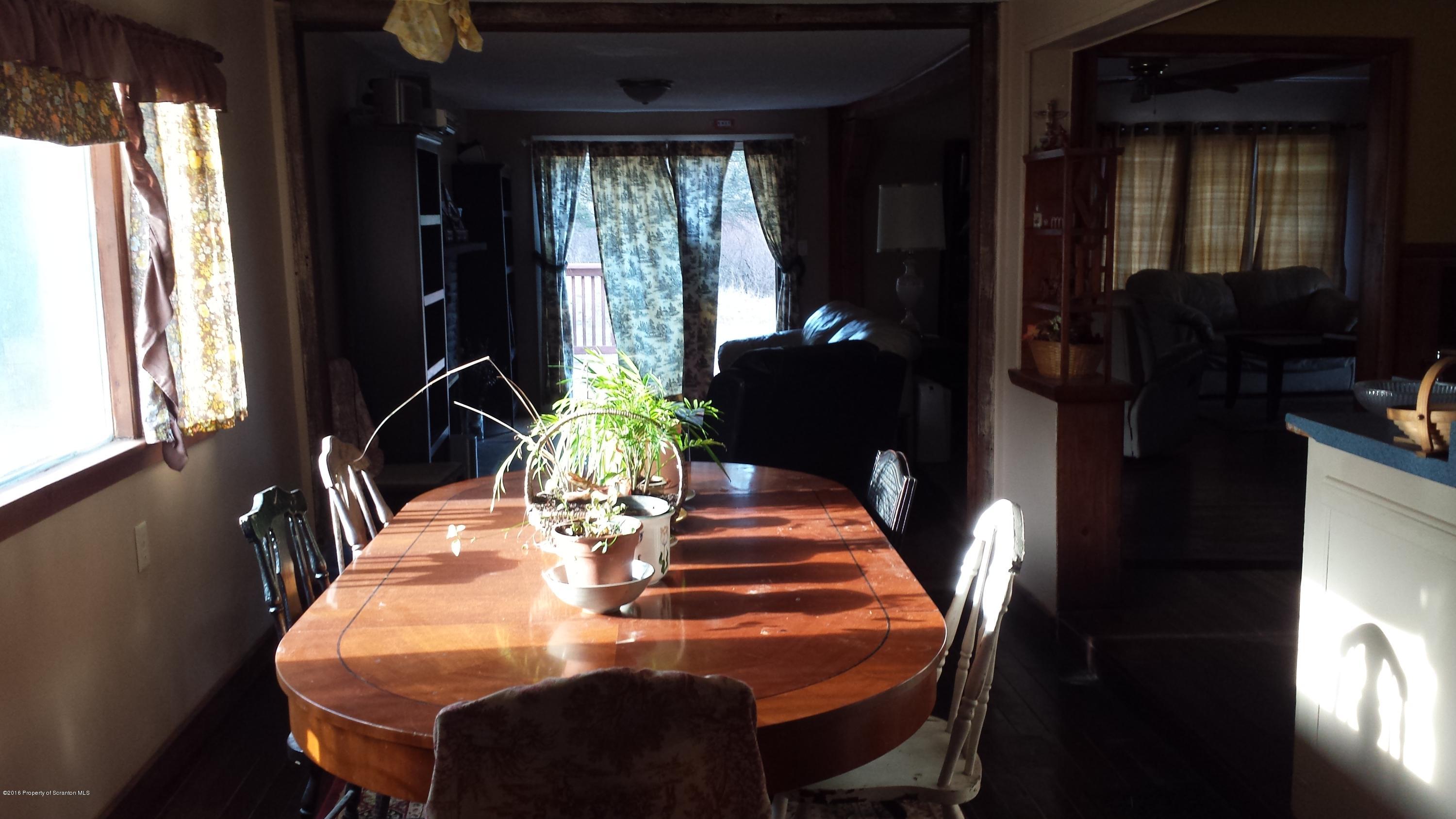 6591 Lindaville Road Kingsley, PA 18826 - Photo 5 of 28 a dining room with furniture and window