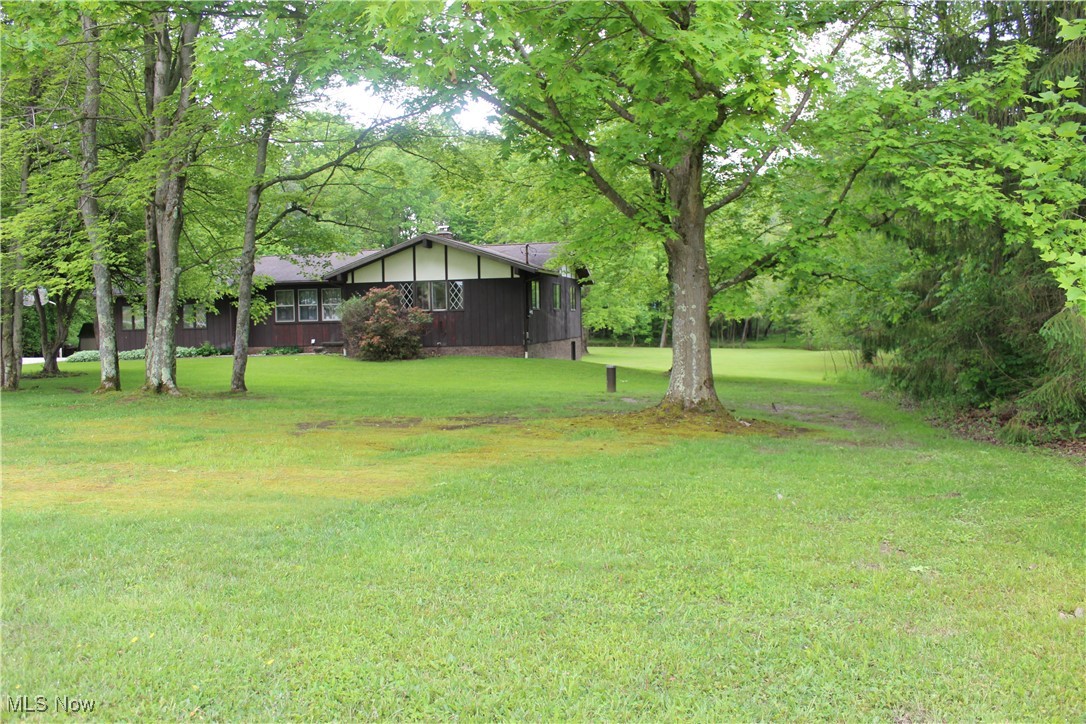 666 East Windsor Road Orwell, OH 44076 - Photo 1 of 33 View of green lawn