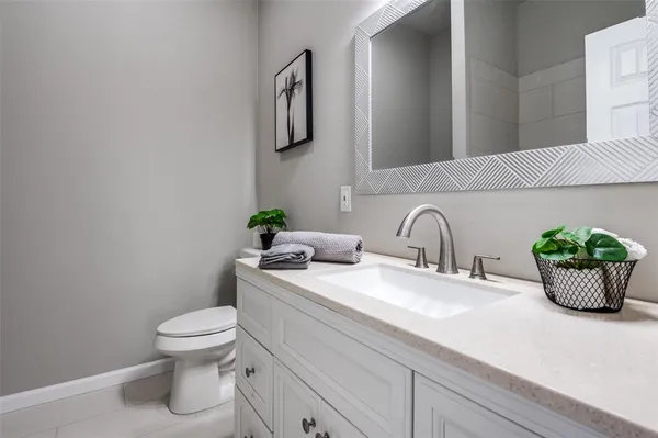 a bathroom with a sink and a toilet