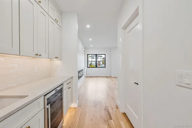 a kitchen with stainless steel appliances granite countertop a stove and a sink