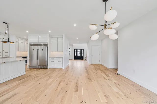 a view of swimming pool with outdoor seating