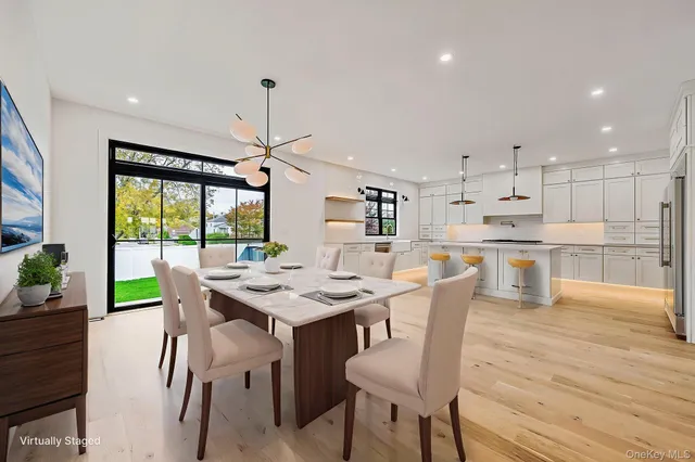 a view of a kitchen with a sink and a window