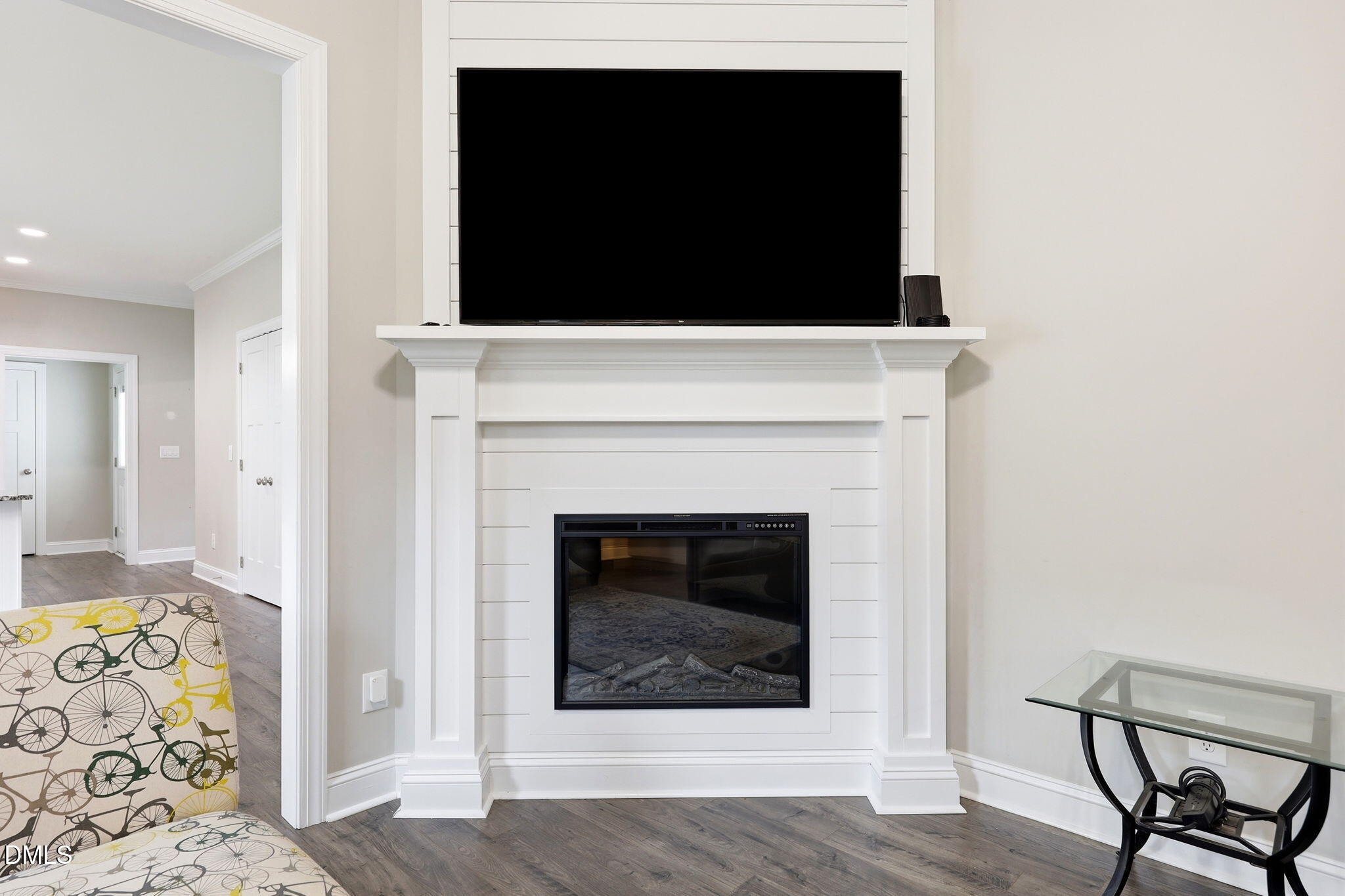 709 South Pollock Street Selma, NC 27576 - Photo 10 of 30 a living room with a fireplace and wooden floor