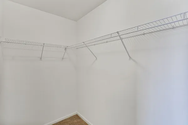 a view of a room with racks on the wall