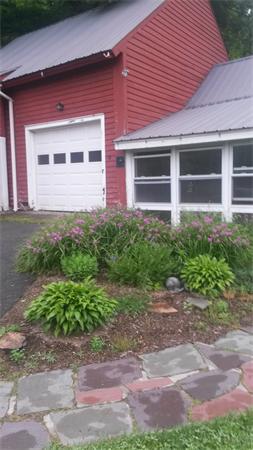 78 Montague Road Leverett, MA 01054 - Photo 6 of 30 a front view of a house with garden