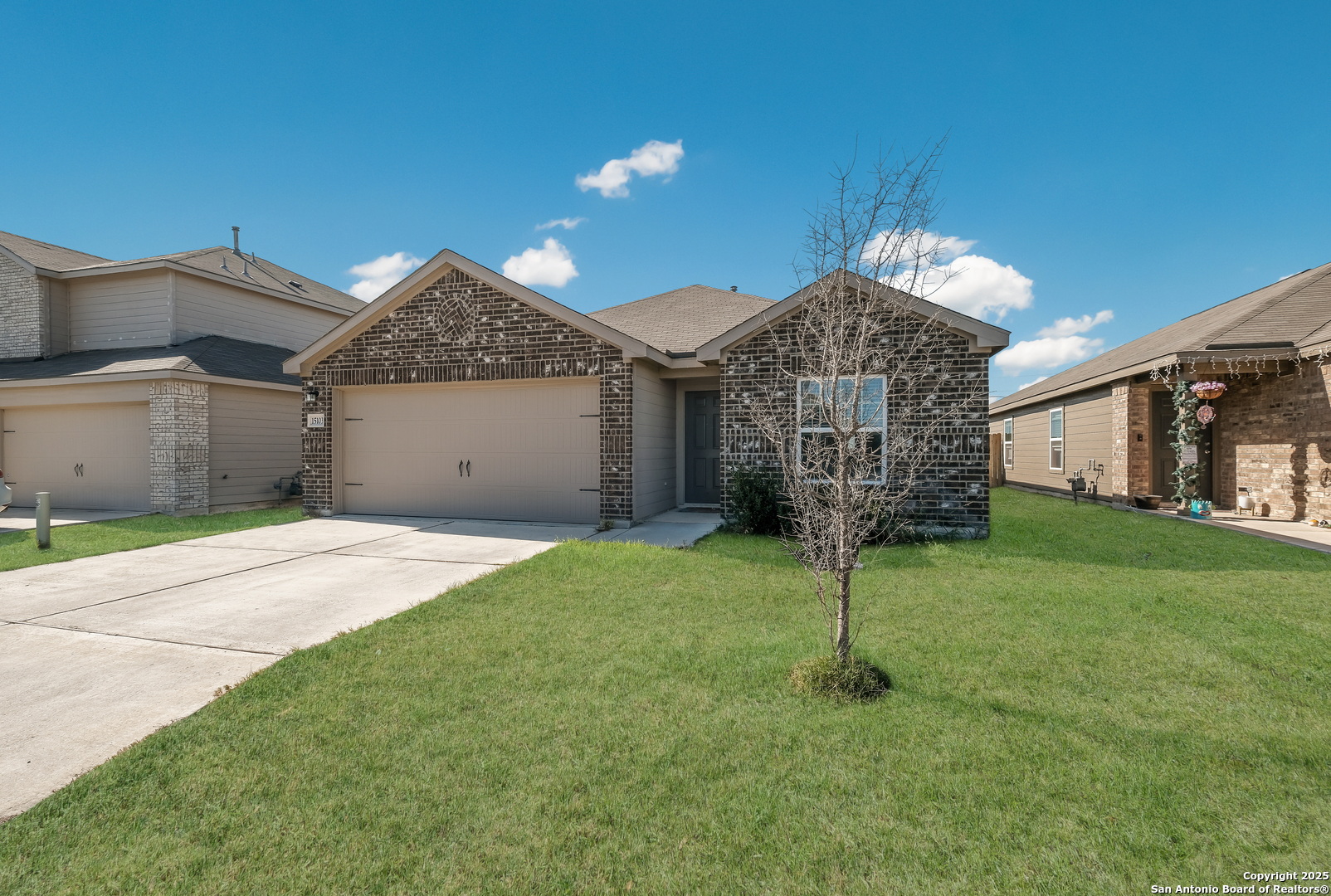 15103 Harbor Landing Von Ormy, TX 78073 - Photo 1 of 1 a front view of a house with a garden