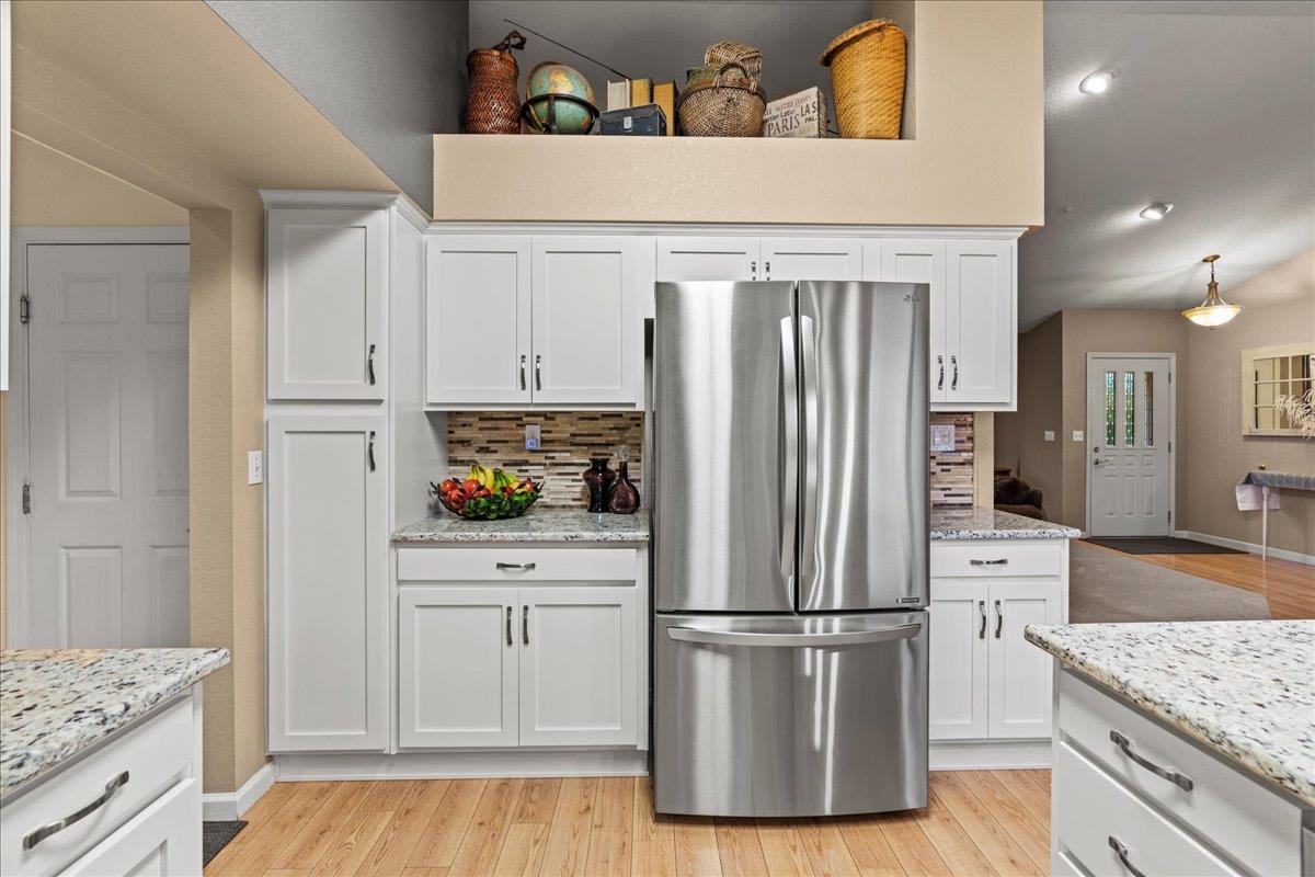 6980 Timeview Way Prunedale, CA 93907 - Photo 11 of 47 a kitchen with a refrigerator and a stove