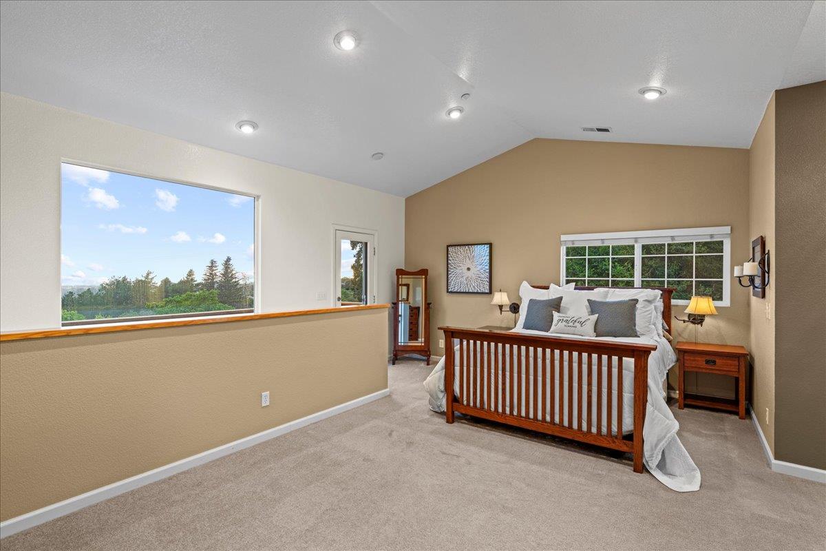 6980 Timeview Way Prunedale, CA 93907 - Photo 15 of 47 a view of a bedroom with furniture and windows