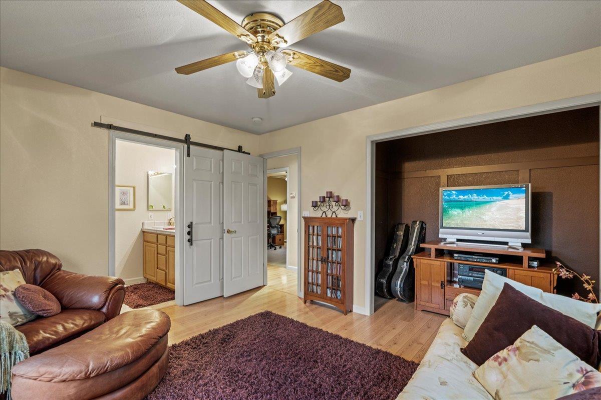 6980 Timeview Way Prunedale, CA 93907 - Photo 19 of 47 a living room with furniture and a flat screen tv