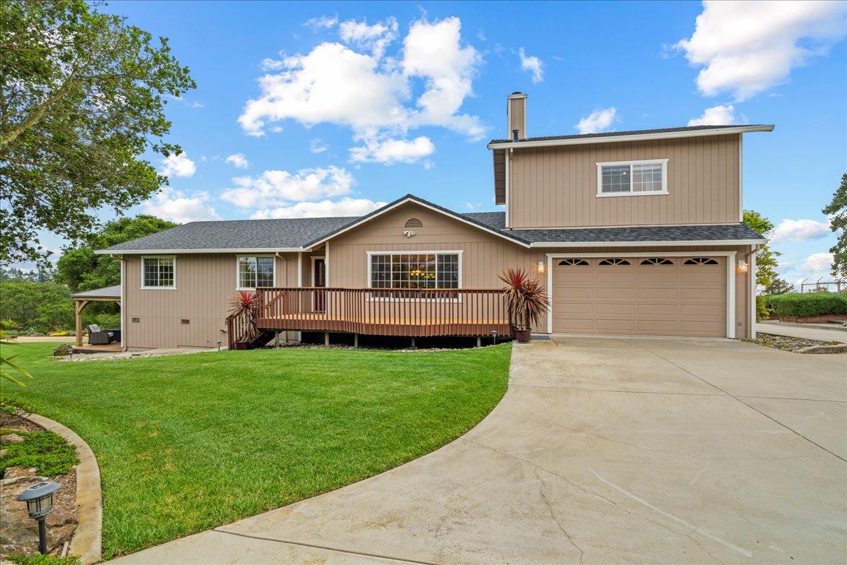 6980 Timeview Way Prunedale, CA 93907 - Photo 2 of 47 a view of front of house with a yard