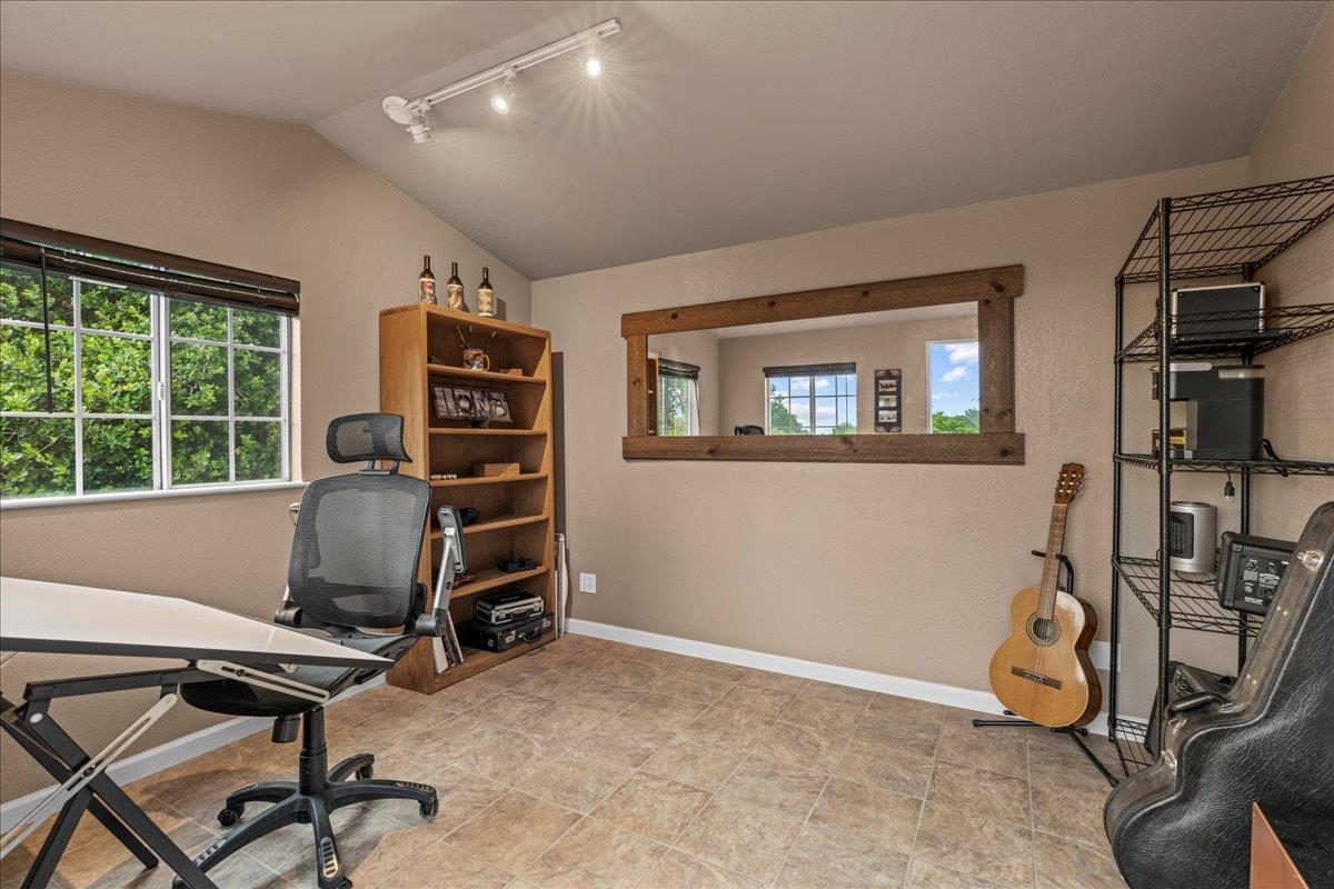 6980 Timeview Way Prunedale, CA 93907 - Photo 36 of 47 a view of a workspace with furniture and a window
