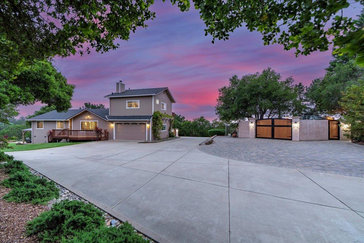 6980 Timeview Way Prunedale, CA 93907 - Photo 39 of 47 a front view of a house with a yard and a large tree