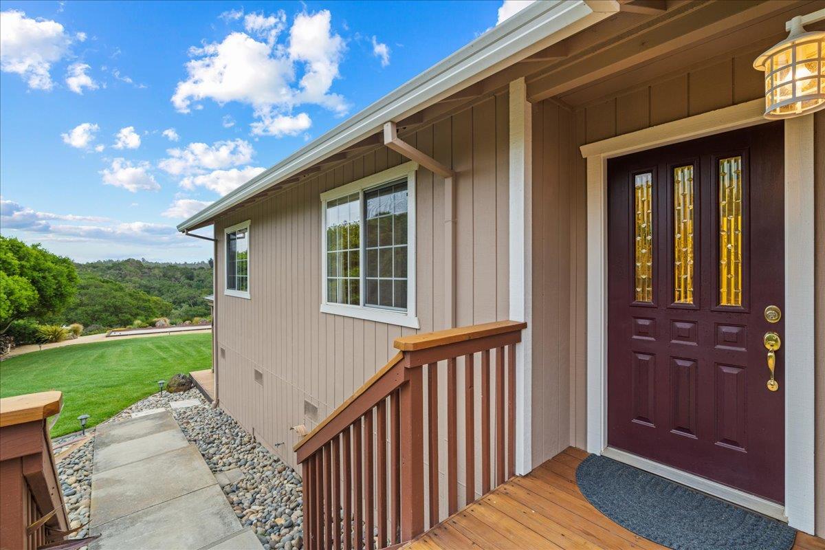 6980 Timeview Way Prunedale, CA 93907 - Photo 4 of 47 a view of a porch with a table and chairs