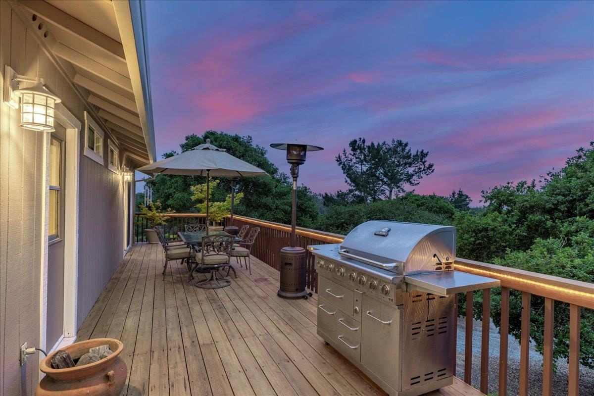 6980 Timeview Way Prunedale, CA 93907 - Photo 42 of 47 a view of a balcony with furniture and wooden floor