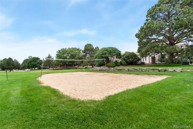 a view of a golf course with a lake