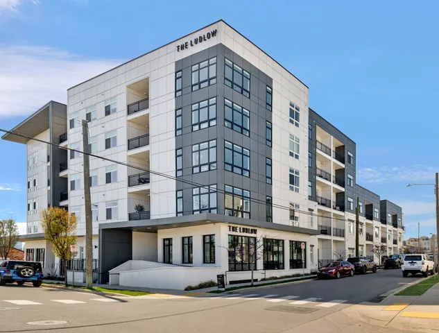 a front view of a building with street view