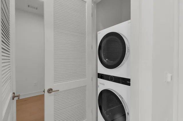 a view of balcony with floor to ceiling windows and stairs