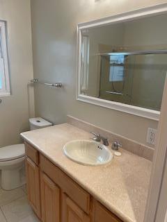 869 Crestview Drive Millbrae, CA 94030 - Photo 11 of 14 a bathroom with a granite countertop sink and a mirror