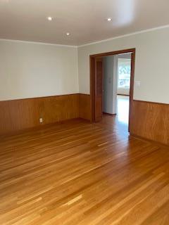 869 Crestview Drive Millbrae, CA 94030 - Photo 3 of 14 an empty room with wooden floor and windows