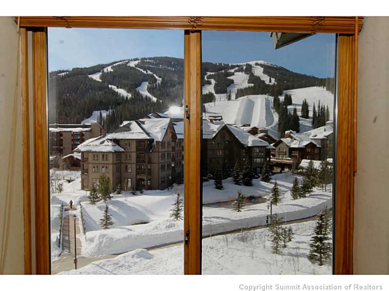 860 Copper Road, Unit 410 Frisco, CO 80443 - Photo 10 of 18 View. This is the view from the master bedroom which has a lounge chair next to the window to soak it all up.