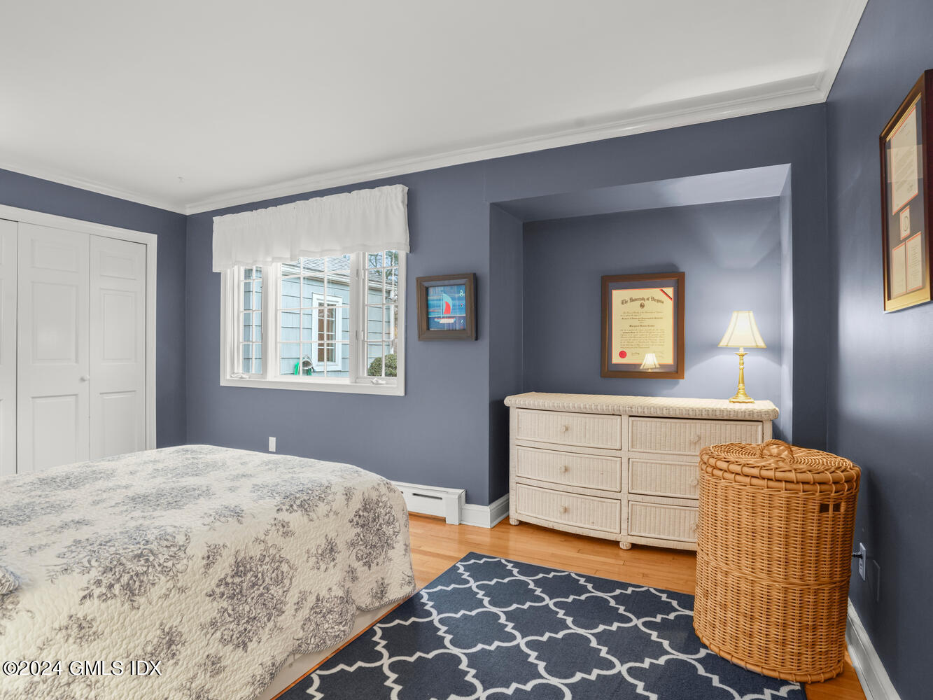 191 Cat Rock Road Cos Cob, CT 06807 - Photo 11 of 30 a bedroom with a bed and a window