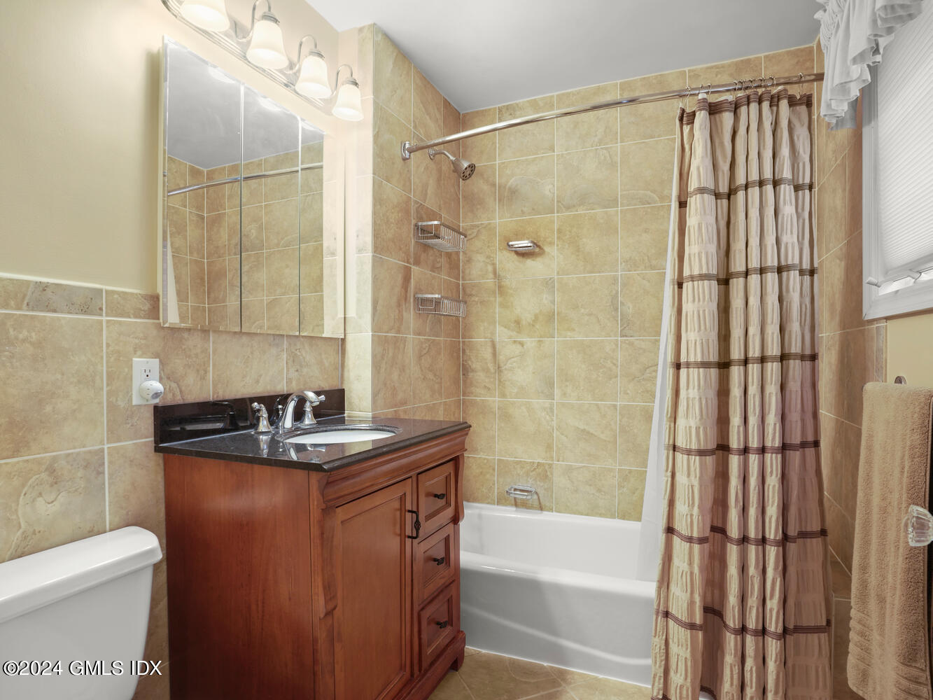 191 Cat Rock Road Cos Cob, CT 06807 - Photo 15 of 30 a bathroom with a sink and a mirror