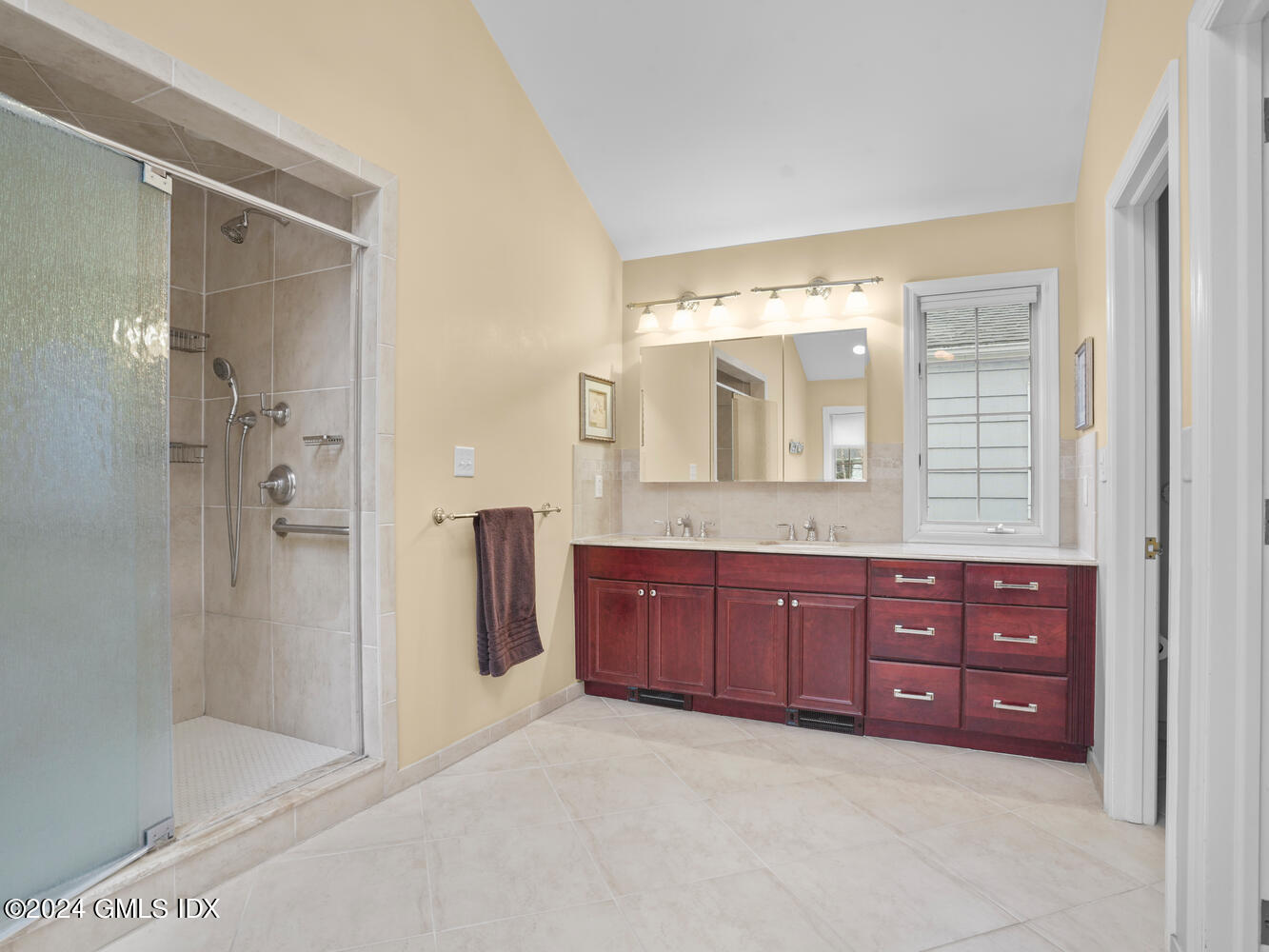 191 Cat Rock Road Cos Cob, CT 06807 - Photo 19 of 30 a bathroom with a granite countertop sink mirror and shower