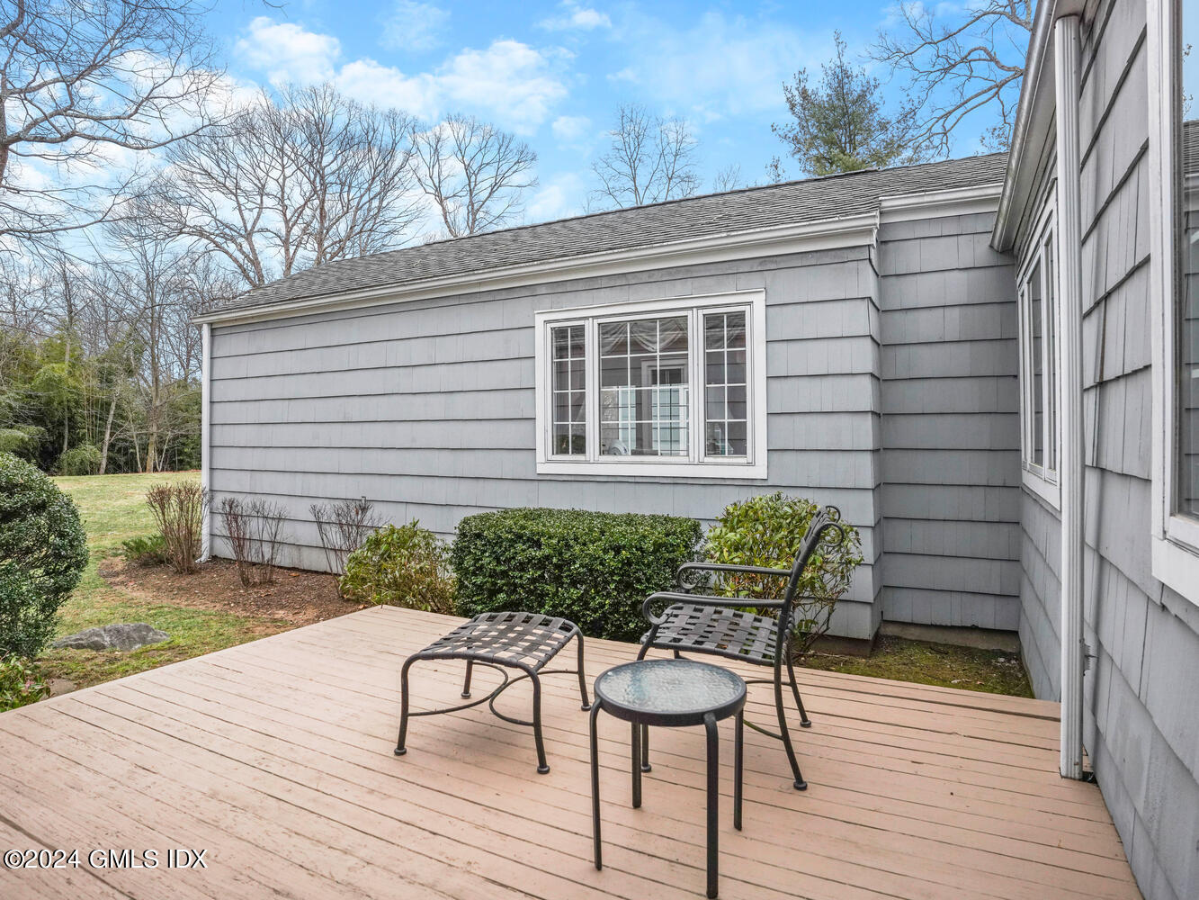 191 Cat Rock Road Cos Cob, CT 06807 - Photo 26 of 30 a front view of a house with patio