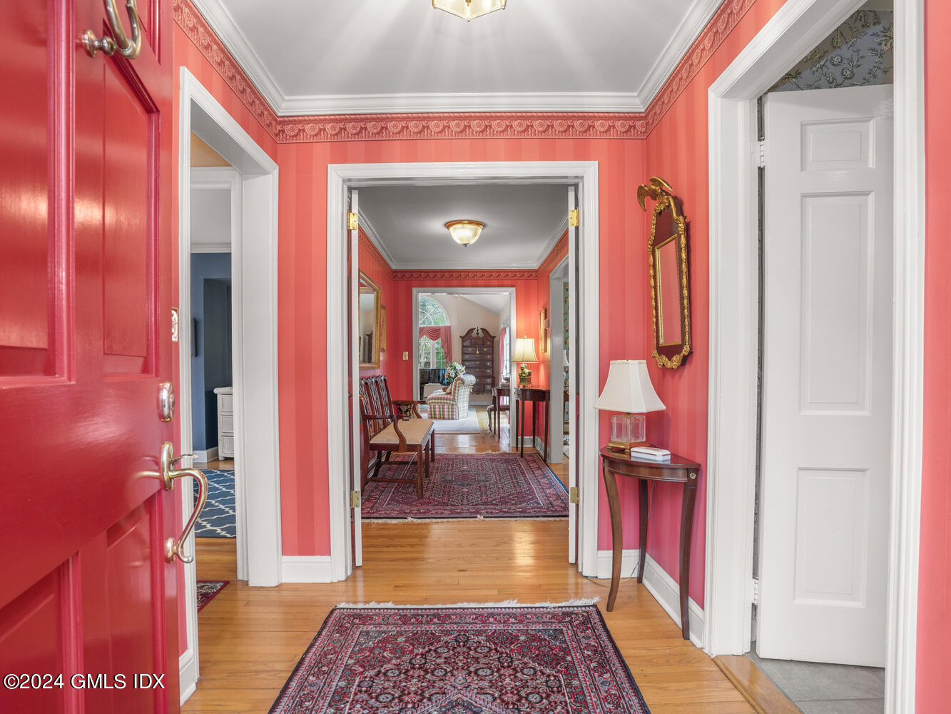 191 Cat Rock Road Cos Cob, CT 06807 - Photo 3 of 30 a view of a hallway with dining area