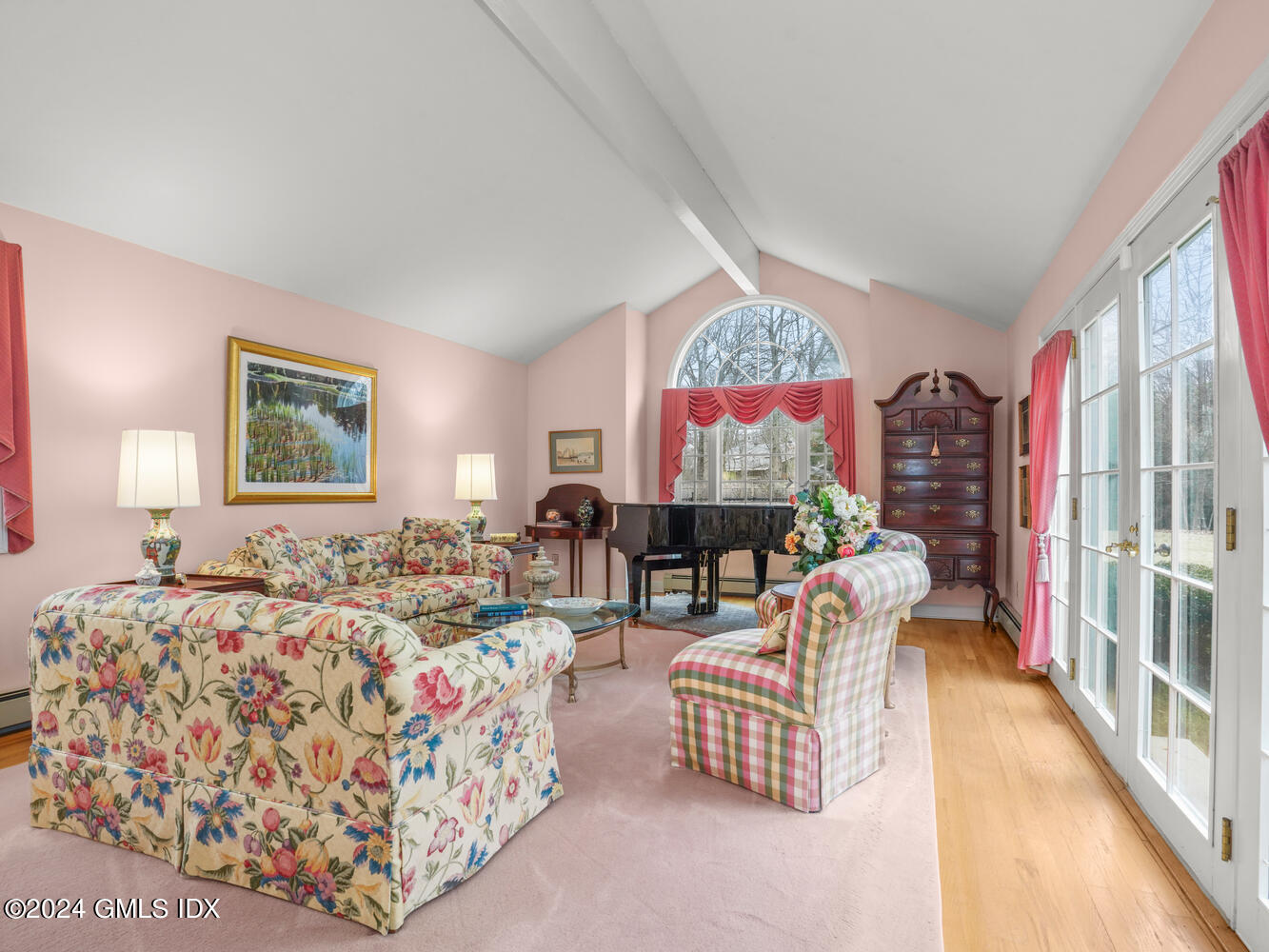 191 Cat Rock Road Cos Cob, CT 06807 - Photo 4 of 30 a bed room with bed and a large window