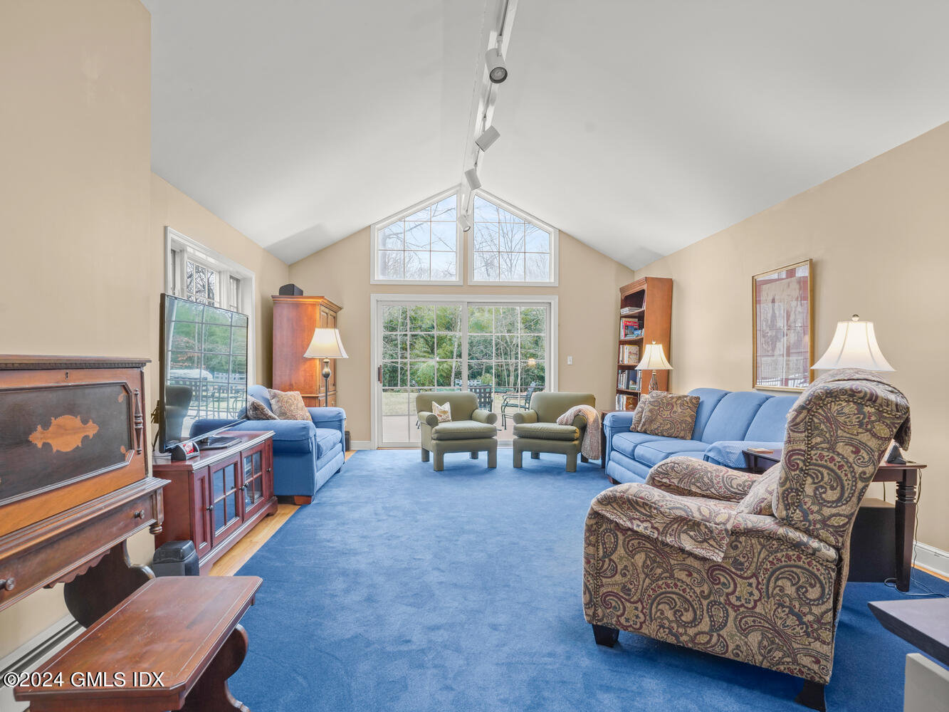 191 Cat Rock Road Cos Cob, CT 06807 - Photo 9 of 30 a living room with furniture and a large window