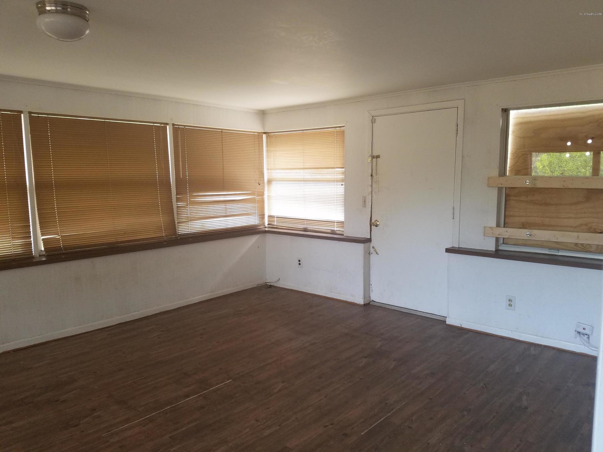 7124 Oakney Road Jacksonville, FL 32211 - Photo 14 of 51 a view of an empty room with a window