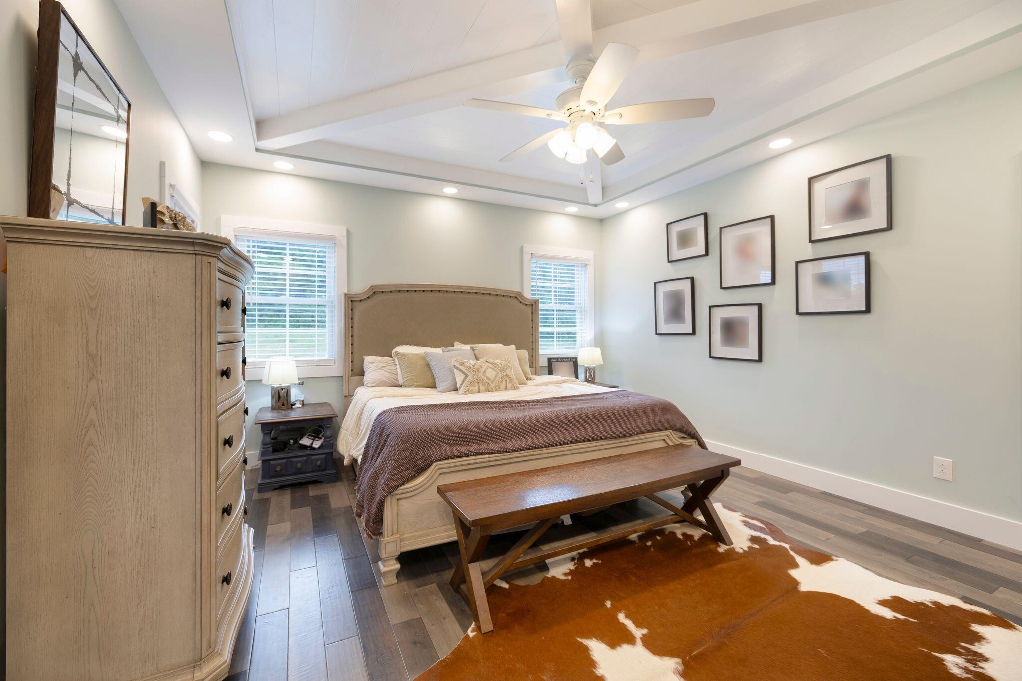 6866 Daus Mountain Road Whitwell, TN 37397 - Photo 14 of 49 a bedroom with a bed and wooden floor