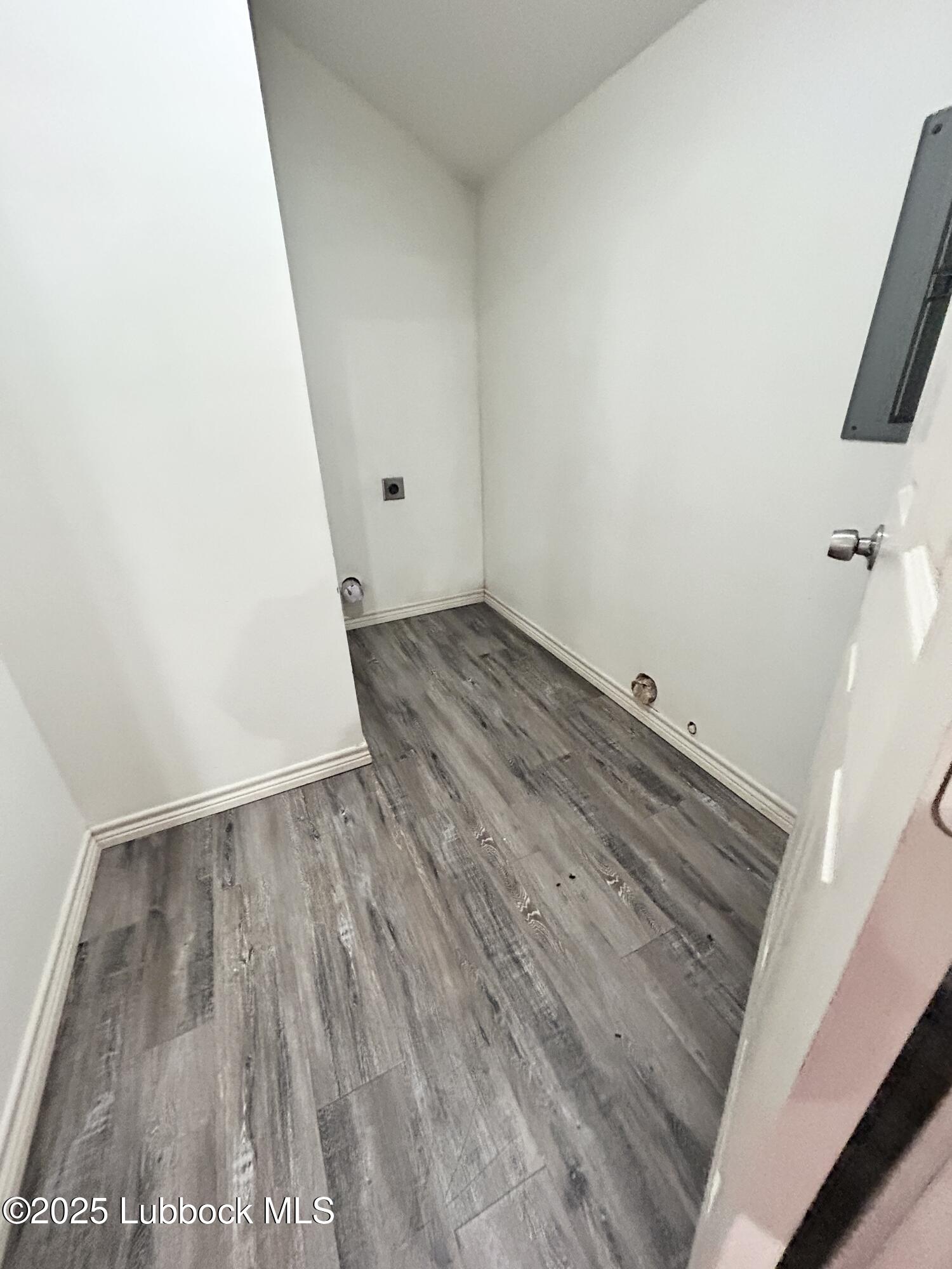1912 21st Street Lubbock, TX 79411 - Photo 9 of 9 a view of a room with wooden floor