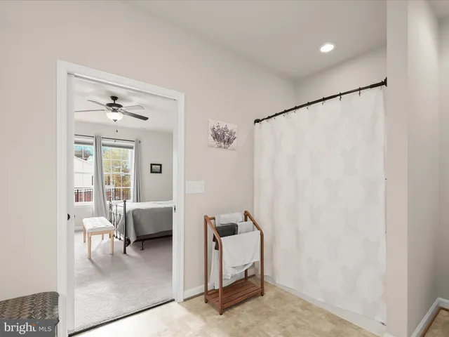 a view of a livingroom with furniture and windows