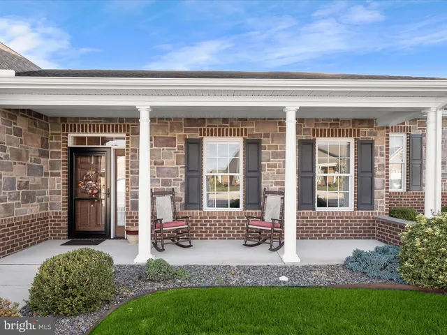 front view of a house with a small yard