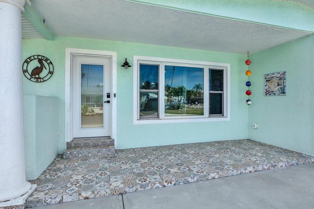203 163rd Avenue Redington Beach, FL 33708 - Photo 2 of 31 a view of a hallway to rooms