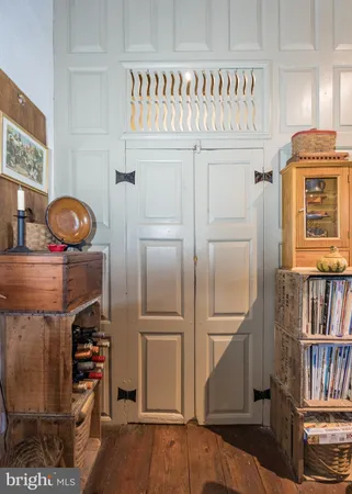 a book shelf with books and knick knacks on it