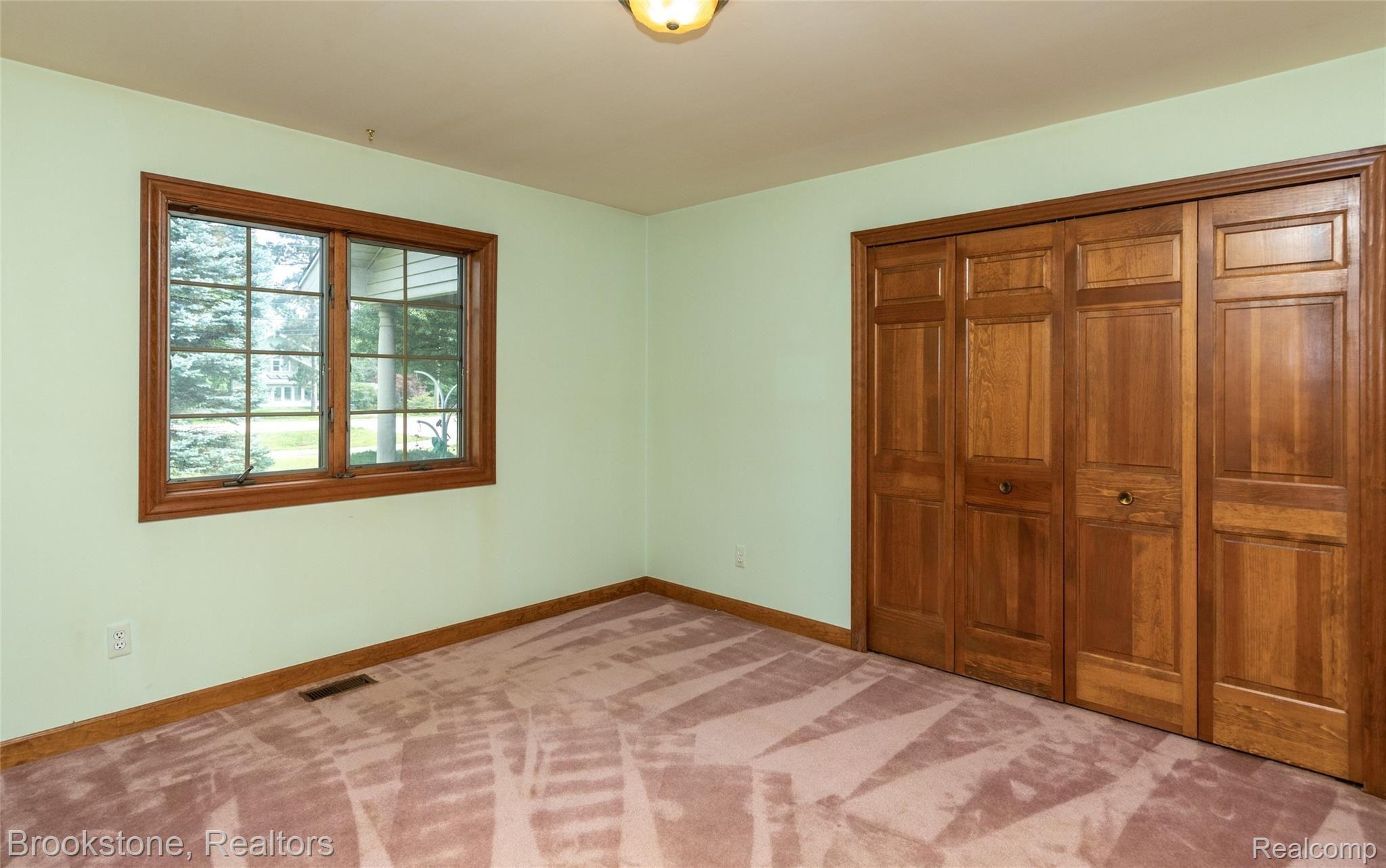 679 West Hamlin Road Rochester, MI 48307 - Photo 31 of 35 Oversized Closet w solid wood doors