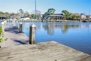18617 Egret Bay Boulevard, Unit 708 Webster, TX 77058 - Photo 18 of 19 a view of a lake with a house
