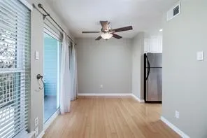 a kitchen with a granite countertop refrigerator a sink and dishwasher