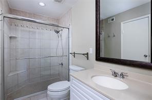 18617 Egret Bay Boulevard, Unit 708 Webster, TX 77058 - Photo 9 of 19 a bathroom with a sink toilet and shower