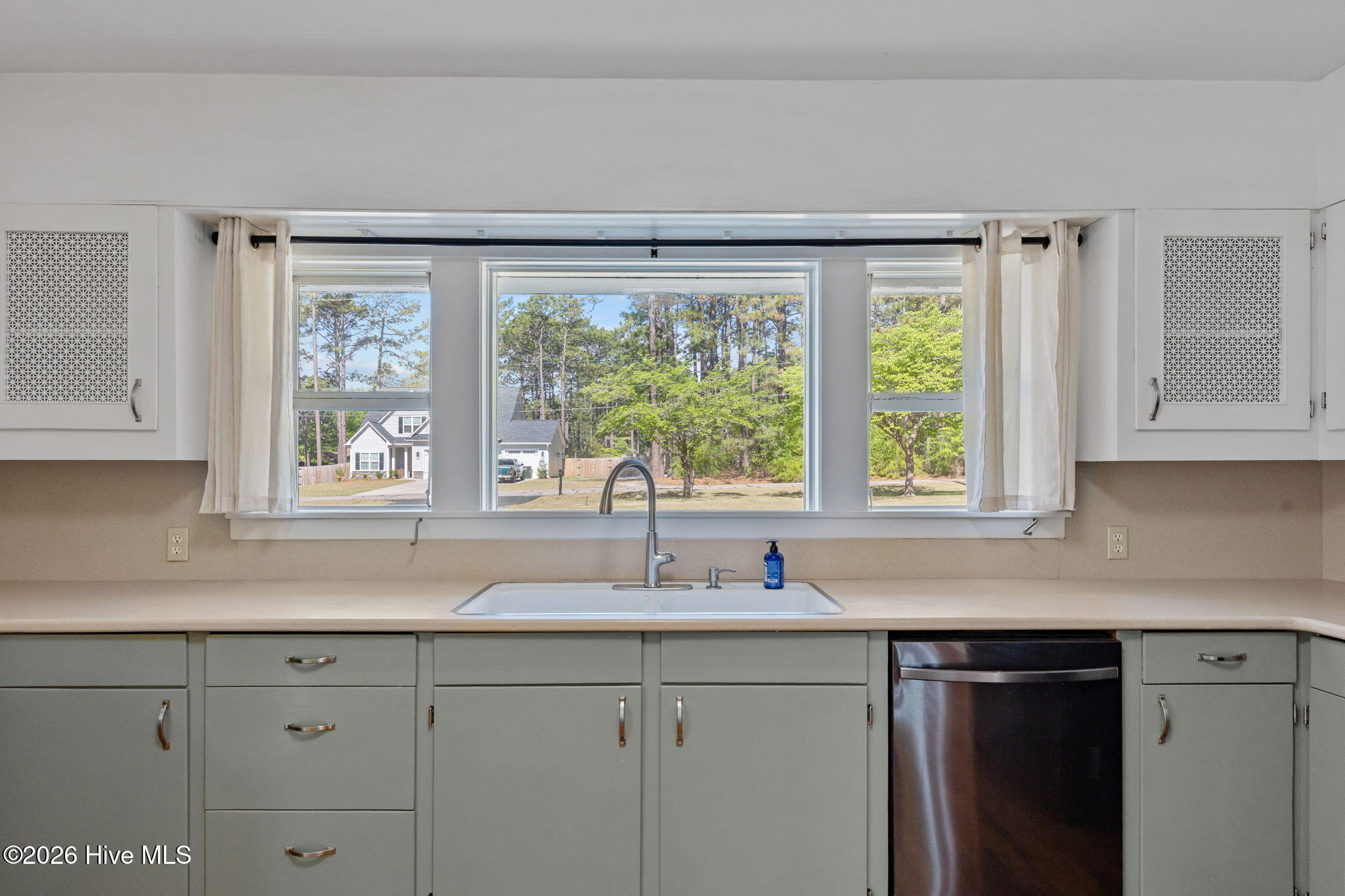1010 Bion Butler Road Aberdeen, NC 28315 - Photo 15 of 62 Farmhouse sink with a brand new faucet and garbage disposal!