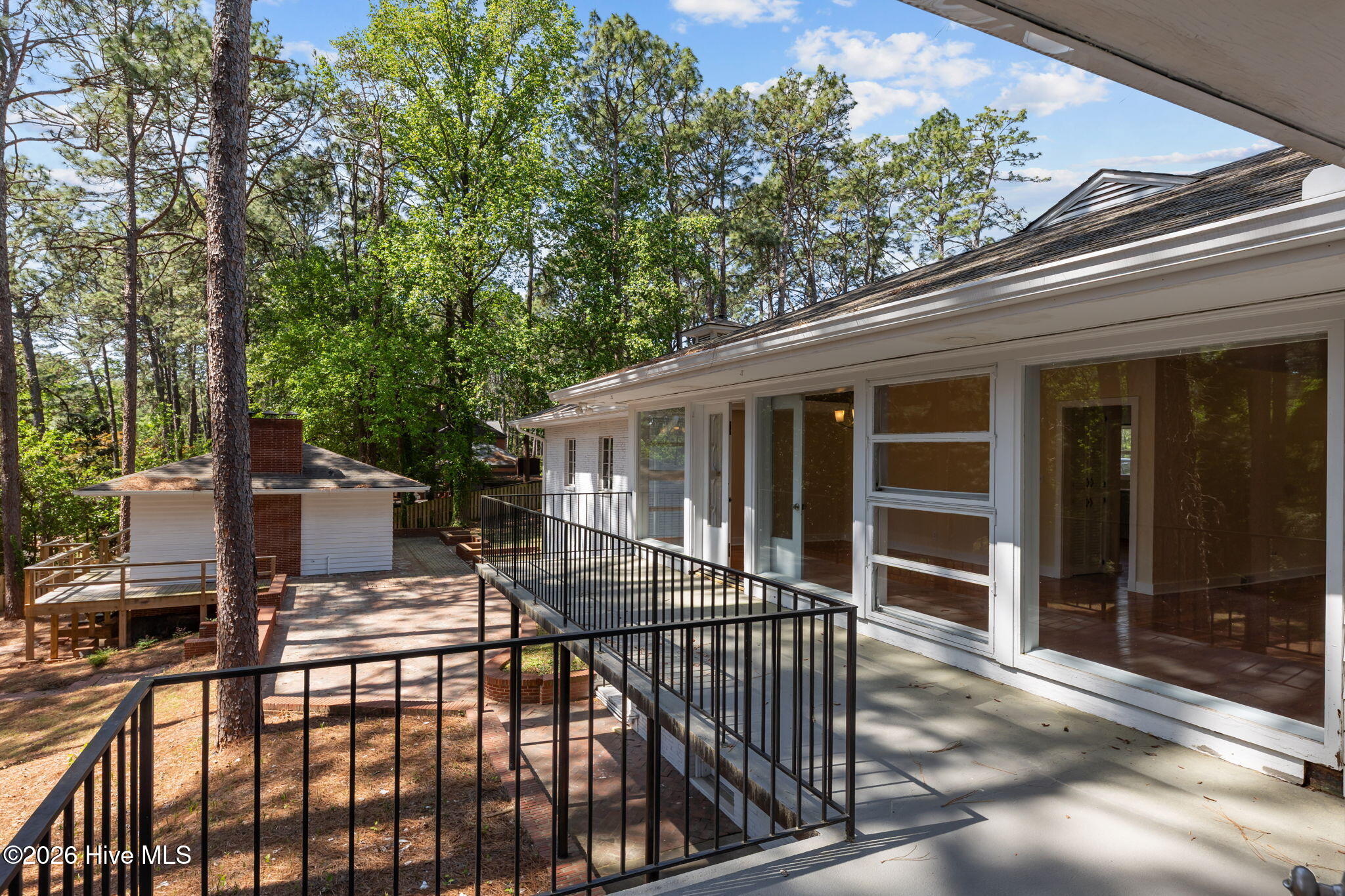 1010 Bion Butler Road Aberdeen, NC 28315 - Photo 3 of 62 Walk-out primary suite overlooking freshly landscaped backyard