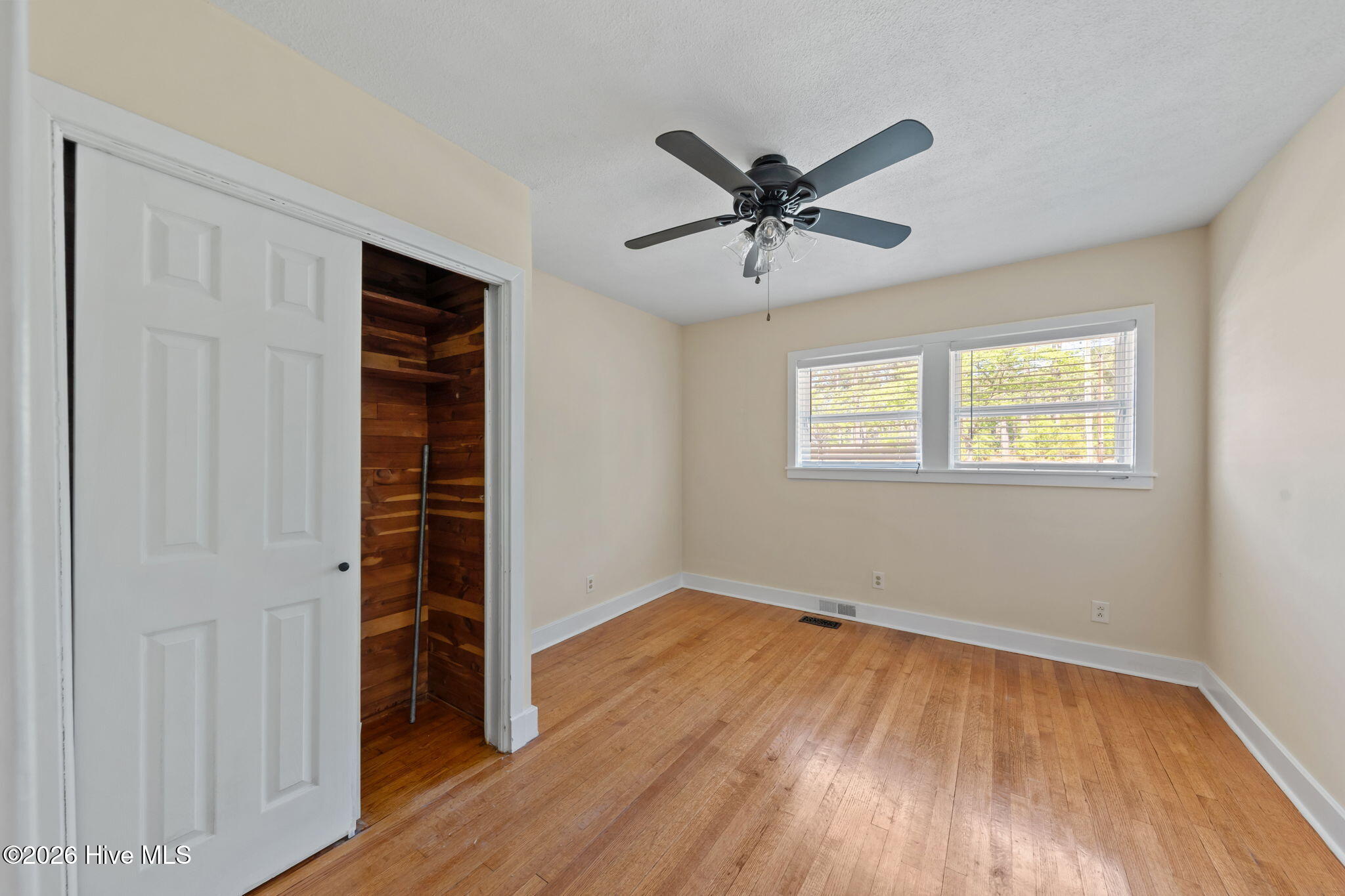 1010 Bion Butler Road Aberdeen, NC 28315 - Photo 35 of 62 Cedar closet + hardwood floors in bedroom 4